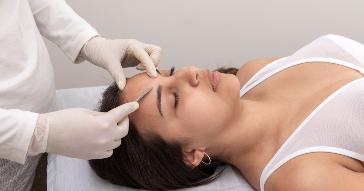 Dermaplaning treatment on a woman face at skincare clinic in Freeland, MI