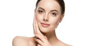 Woman showing glowing, smooth skin after microneedling treatment in Freeland, MI.