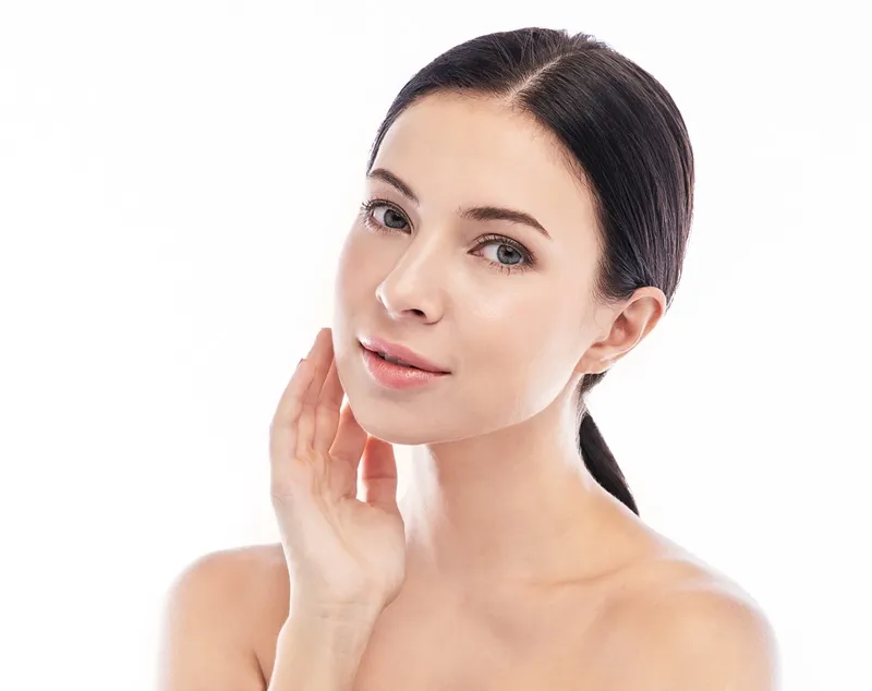 Young Female with glowing and smooth skin after Acne Treatment at Evolution Aesthetics in Freeland, MI